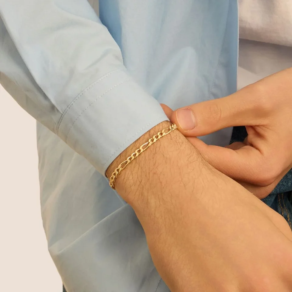 indosso bracciale uomo elegante modello figaro 3+1 alternato in oro giallo 375 9kt di baravelli gold